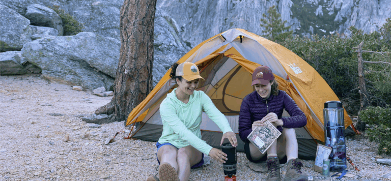 two people enjoying nutritious farm to summit dehydrated meals